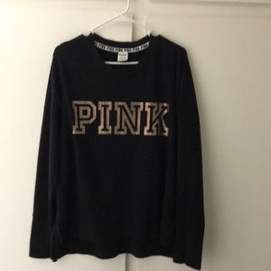 Pink sweatshirt.